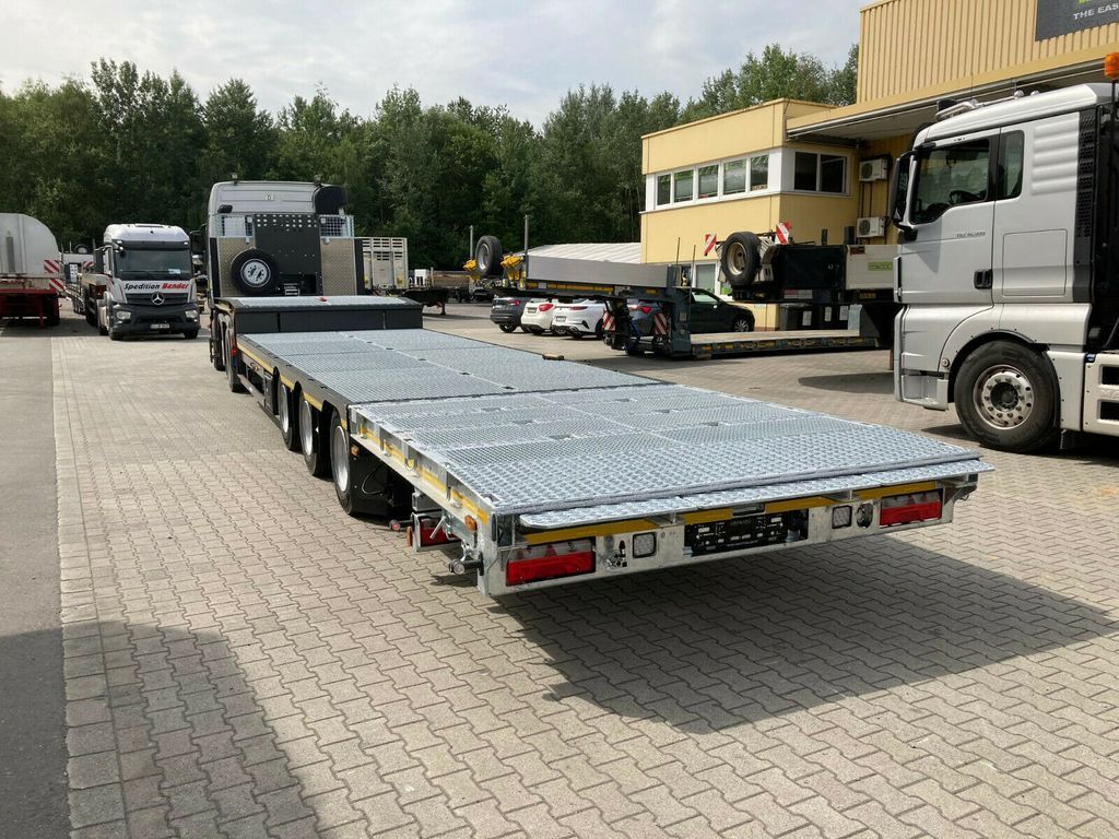 Meusburger 3-Achs-Satteltieflader mit abklappbarem Heck - Poluprikolica s niskim utovarivačem: slika Meusburger 3-Achs-Satteltieflader mit abklappbarem Heck - Poluprikolica s niskim utovarivačem Meusburger 3-Achs-Satteltieflader mit abklappbarem Heck - Poluprikolica s niskim utovarivačem: slika Meusburger 3-Achs-Satteltieflader mit abklappbarem Heck - Poluprikolica s niskim utovarivačem