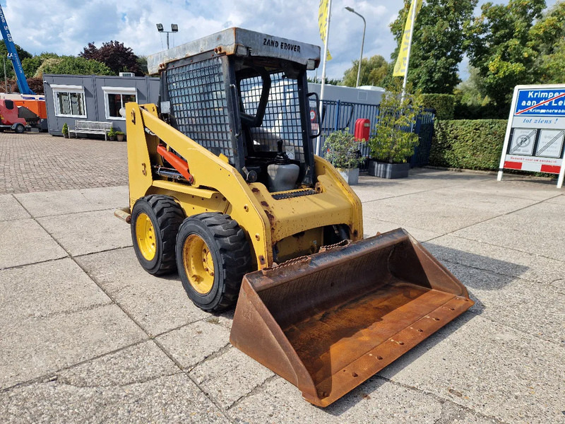 Caterpillar 216B3 schranklader met 1191 uur - Mini utovarivač: slika Caterpillar 216B3 schranklader met 1191 uur - Mini utovarivač Caterpillar 216B3 schranklader met 1191 uur - Mini utovarivač: slika Caterpillar 216B3 schranklader met 1191 uur - Mini utovarivač