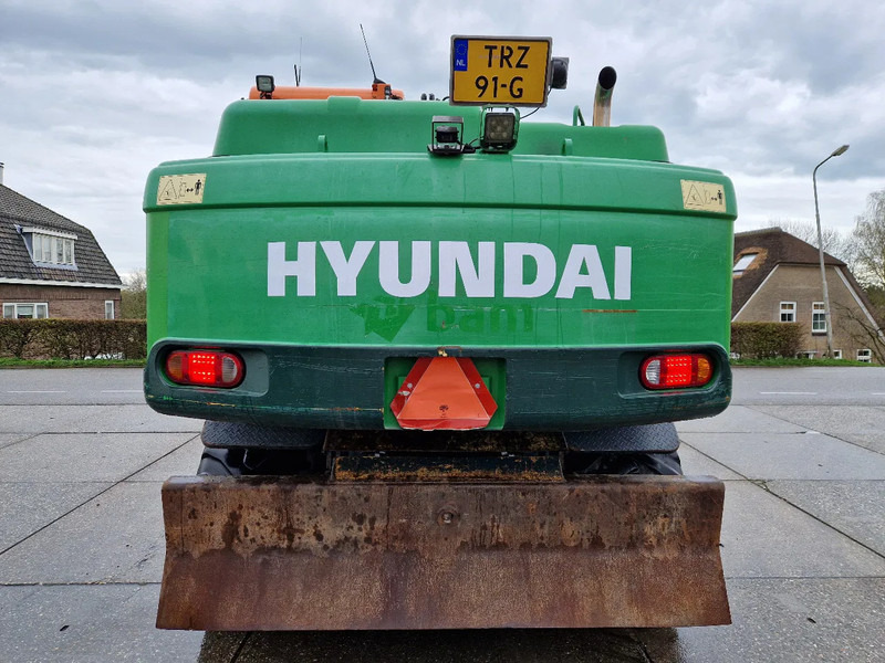 Hyundai Robex 160W-9A met 6-cilinder Cummins motor - Bager na kotačima: slika Hyundai Robex 160W-9A met 6-cilinder Cummins motor - Bager na kotačima Hyundai Robex 160W-9A met 6-cilinder Cummins motor - Bager na kotačima: slika Hyundai Robex 160W-9A met 6-cilinder Cummins motor - Bager na kotačima