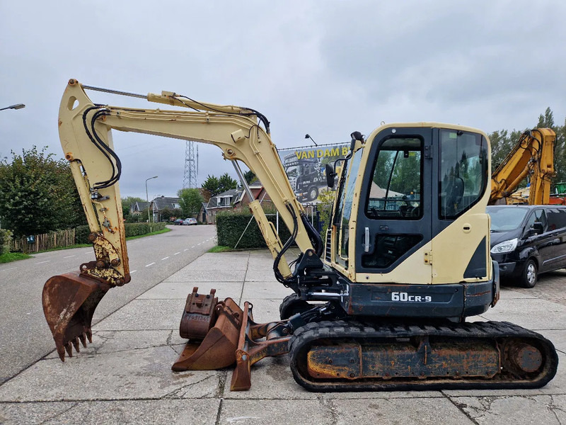 Hyundai Robex CR60-9 met airco - Mini bager: slika Hyundai Robex CR60-9 met airco - Mini bager Hyundai Robex CR60-9 met airco - Mini bager: slika Hyundai Robex CR60-9 met airco - Mini bager