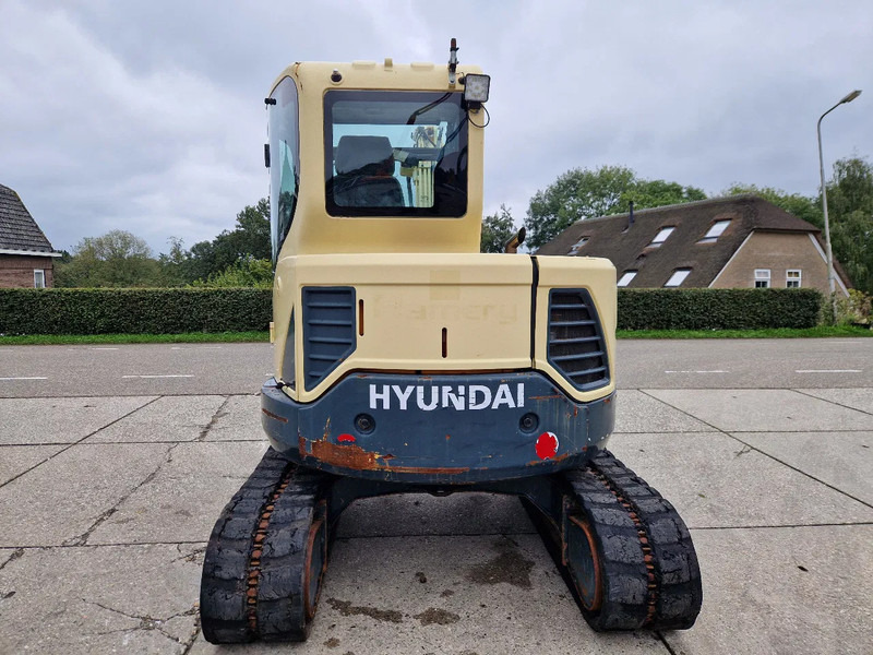 Hyundai Robex CR60-9 met airco - Mini bager: slika Hyundai Robex CR60-9 met airco - Mini bager Hyundai Robex CR60-9 met airco - Mini bager: slika Hyundai Robex CR60-9 met airco - Mini bager