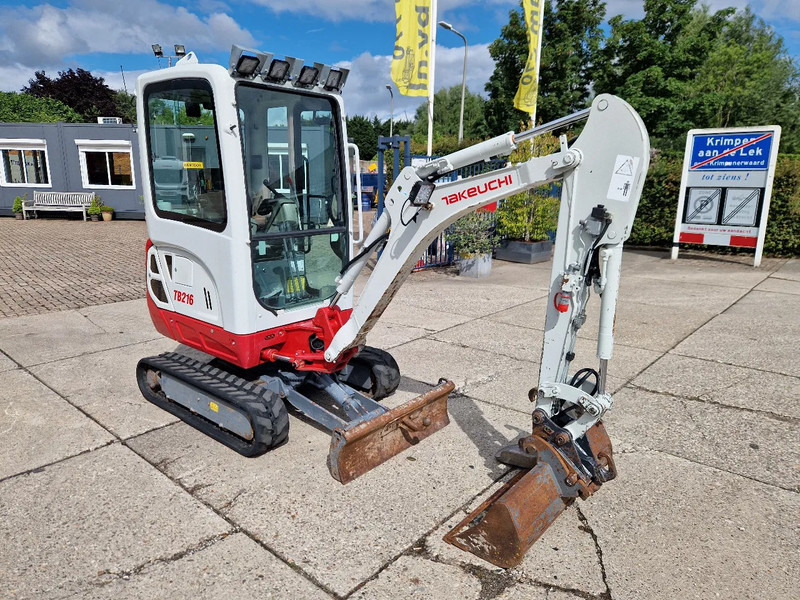 Takeuchi TB216 met 2089 uur - Mini bager: slika Takeuchi TB216 met 2089 uur - Mini bager Takeuchi TB216 met 2089 uur - Mini bager: slika Takeuchi TB216 met 2089 uur - Mini bager