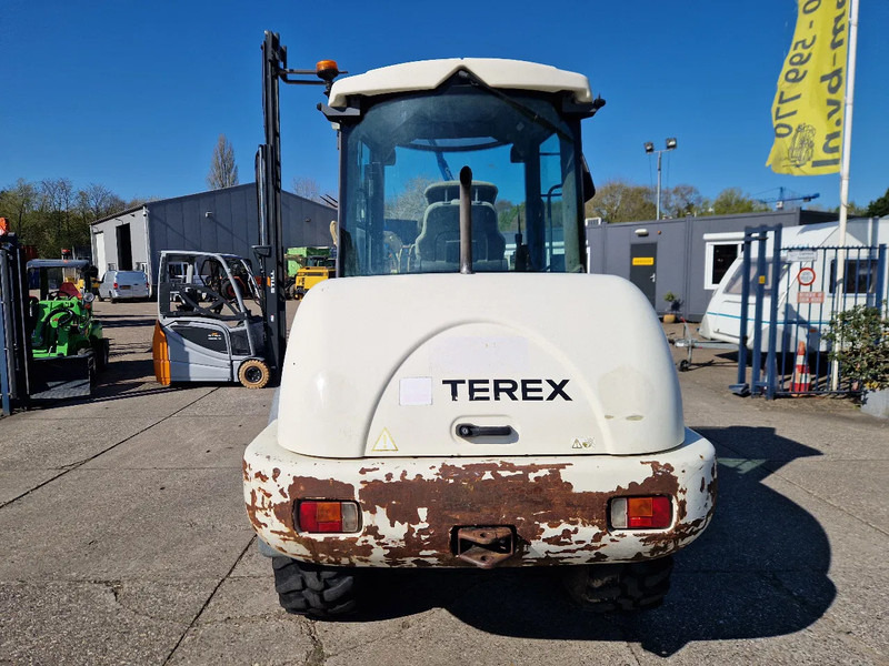 Terex TL80 palletvorken en 4in1-bak - Utovarivač na kotačima: slika Terex TL80 palletvorken en 4in1-bak - Utovarivač na kotačima Terex TL80 palletvorken en 4in1-bak - Utovarivač na kotačima: slika Terex TL80 palletvorken en 4in1-bak - Utovarivač na kotačima
