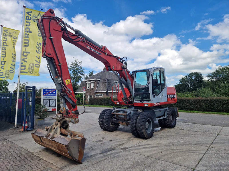 Terex TW160 inclusief kantelbak (1.98m.) - Bager na kotačima: slika Terex TW160 inclusief kantelbak (1.98m.) - Bager na kotačima Terex TW160 inclusief kantelbak (1.98m.) - Bager na kotačima: slika Terex TW160 inclusief kantelbak (1.98m.) - Bager na kotačima