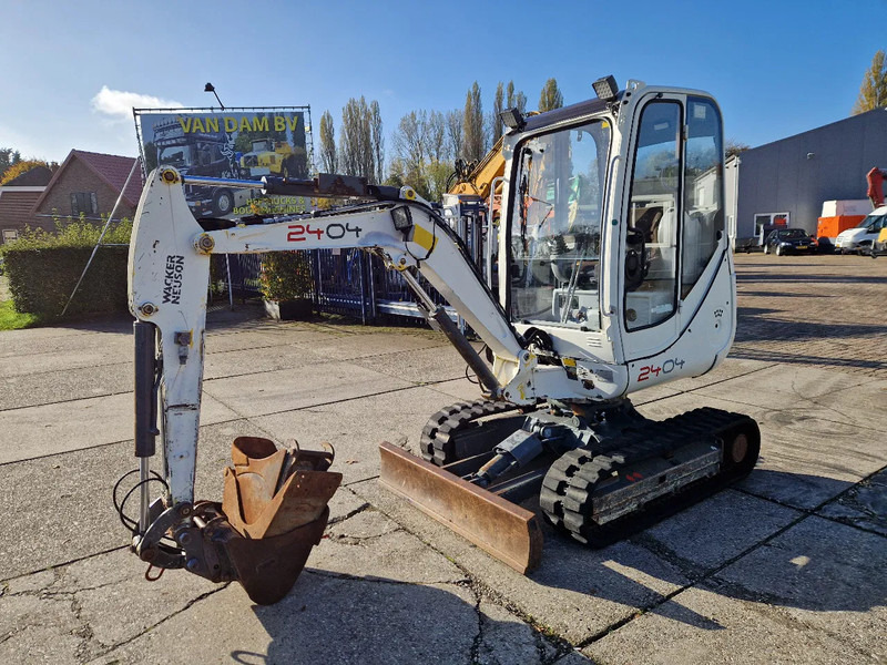 WACKER NEUSON 2404RD met nivelleersysteem, mountain proof - Mini bager: slika WACKER NEUSON 2404RD met nivelleersysteem, mountain proof - Mini bager WACKER NEUSON 2404RD met nivelleersysteem, mountain proof - Mini bager: slika WACKER NEUSON 2404RD met nivelleersysteem, mountain proof - Mini bager