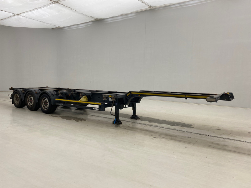 Kögel Polyvalent skelet 20-30-40 ft - Transporter kontejnera/ Poluprikolica s izmjenjivim sanducima: slika Kögel Polyvalent skelet 20-30-40 ft - Transporter kontejnera/ Poluprikolica s izmjenjivim sanducima Kögel Polyvalent skelet 20-30-40 ft - Transporter kontejnera/ Poluprikolica s izmjenjivim sanducima: slika Kögel Polyvalent skelet 20-30-40 ft - Transporter kontejnera/ Poluprikolica s izmjenjivim sanducima