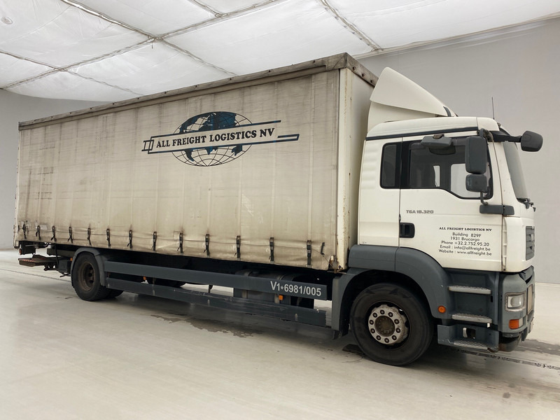 MAN TGA 18.320 - Kamion s ceradom: slika MAN TGA 18.320 - Kamion s ceradom MAN TGA 18.320 - Kamion s ceradom: slika MAN TGA 18.320 - Kamion s ceradom