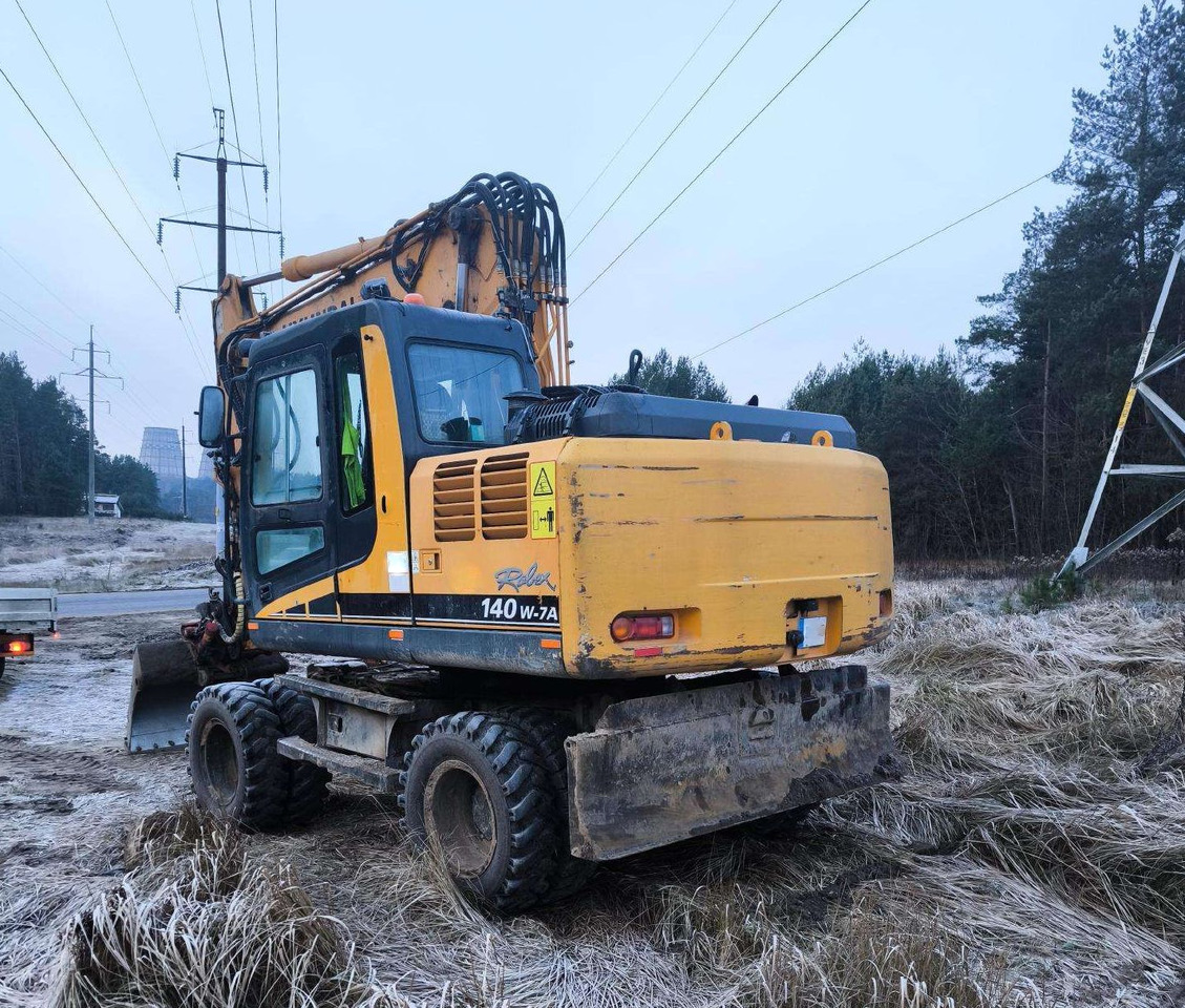 HYUNDAI R 140 W - Bager na kotačima: slika HYUNDAI R 140 W - Bager na kotačima HYUNDAI R 140 W - Bager na kotačima: slika HYUNDAI R 140 W - Bager na kotačima