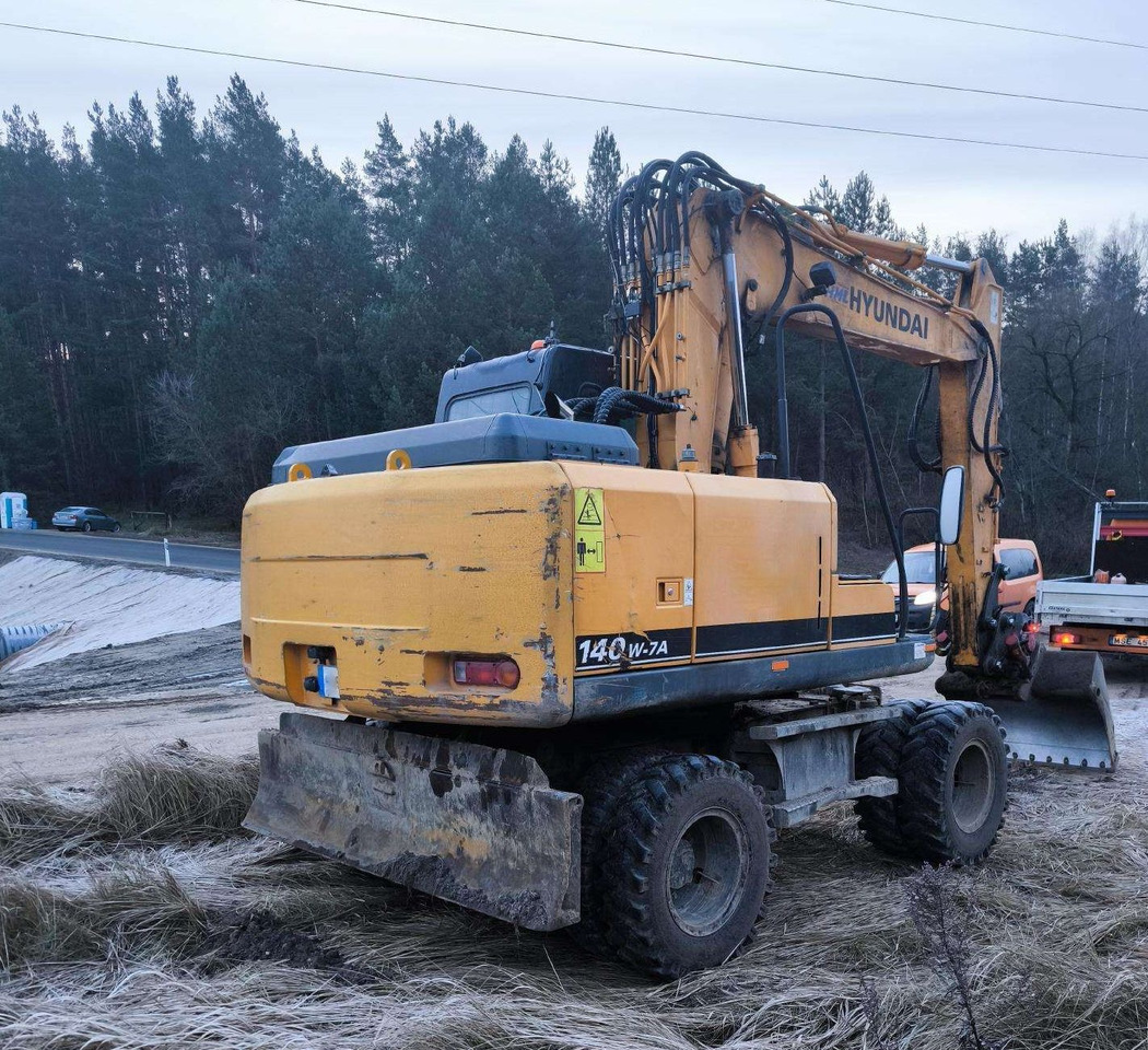 HYUNDAI R 140 W - Bager na kotačima: slika HYUNDAI R 140 W - Bager na kotačima HYUNDAI R 140 W - Bager na kotačima: slika HYUNDAI R 140 W - Bager na kotačima