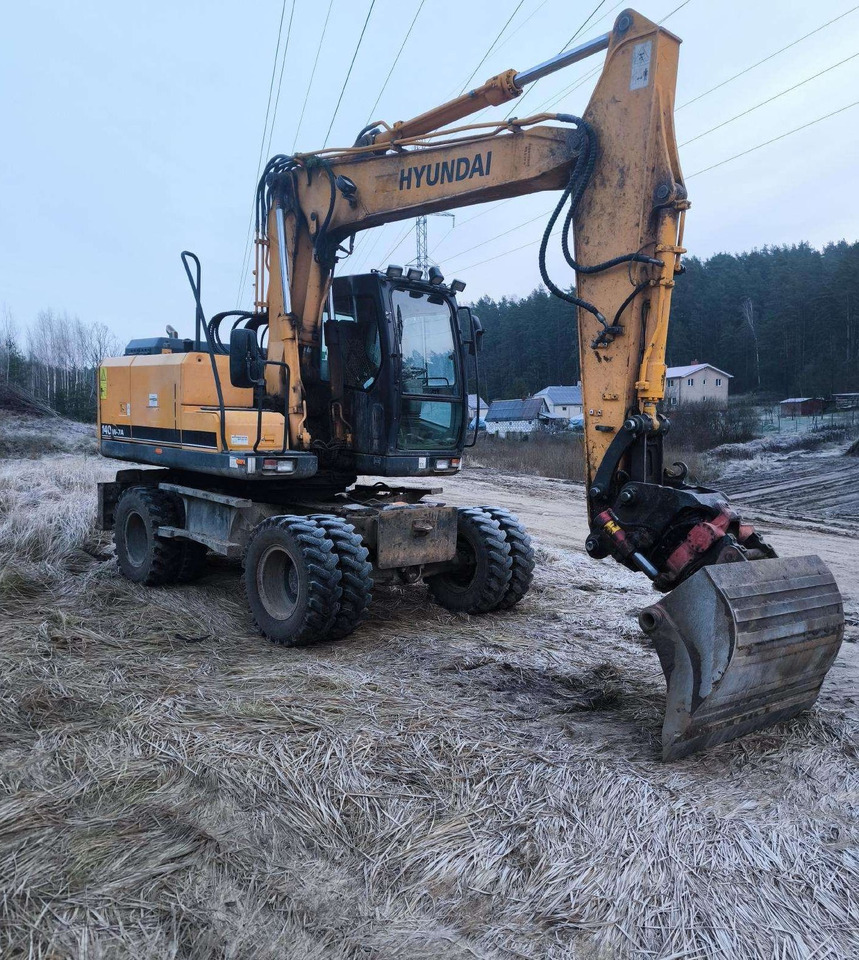 HYUNDAI R 140 W - Bager na kotačima: slika HYUNDAI R 140 W - Bager na kotačima HYUNDAI R 140 W - Bager na kotačima: slika HYUNDAI R 140 W - Bager na kotačima