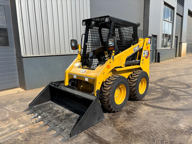 Caterpillar 216B3 - Utovarivač: slika Caterpillar 216B3 - Utovarivač Caterpillar 216B3 - Utovarivač: slika Caterpillar 216B3 - Utovarivač