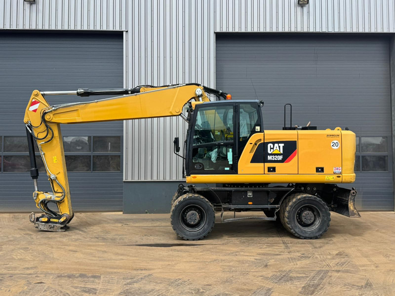Caterpillar M320F - Bager na kotačima: slika Caterpillar M320F - Bager na kotačima Caterpillar M320F - Bager na kotačima: slika Caterpillar M320F - Bager na kotačima