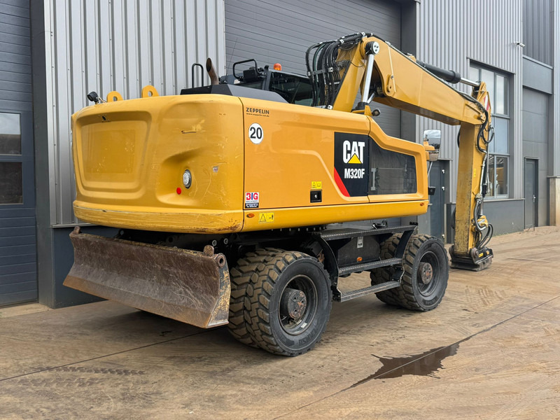 Caterpillar M320F - Bager na kotačima: slika Caterpillar M320F - Bager na kotačima Caterpillar M320F - Bager na kotačima: slika Caterpillar M320F - Bager na kotačima