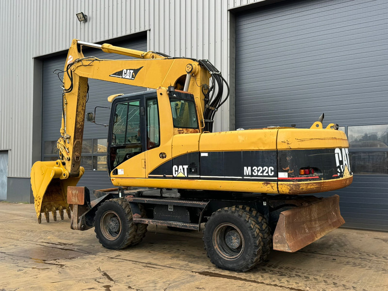 Bager na kotačima Caterpillar M322C - Hydraulic stabilizers / VA Triple boom / CE-certified,: slika Bager na kotačima Caterpillar M322C - Hydraulic stabilizers / VA Triple boom / CE-certified,