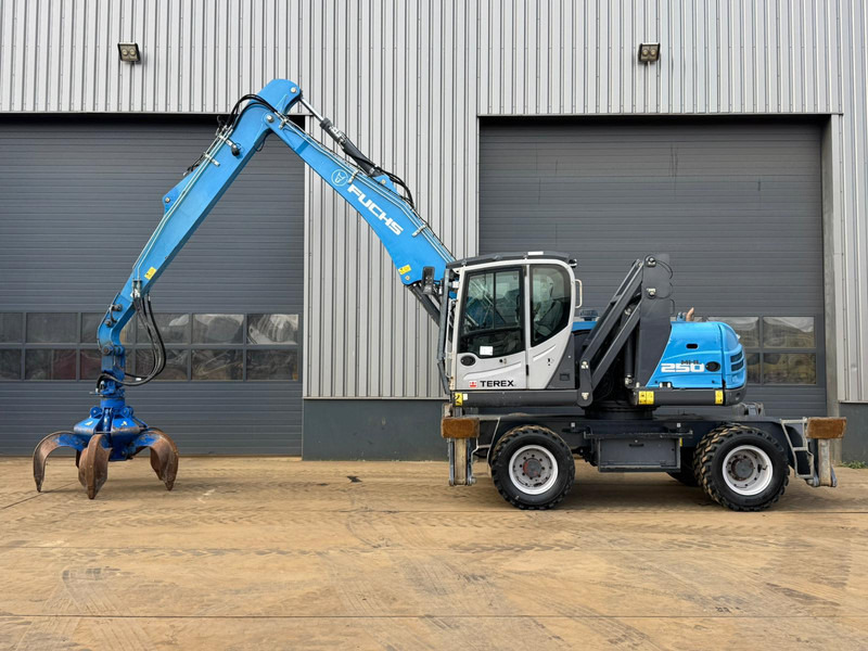 Fuchs MHL 250 - Stroj za rukovanje otpadom: slika Fuchs MHL 250 - Stroj za rukovanje otpadom Fuchs MHL 250 - Stroj za rukovanje otpadom: slika Fuchs MHL 250 - Stroj za rukovanje otpadom