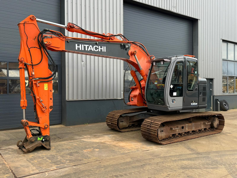 Hitachi ZX135US - Bager gusjeničar: slika Hitachi ZX135US - Bager gusjeničar Hitachi ZX135US - Bager gusjeničar: slika Hitachi ZX135US - Bager gusjeničar