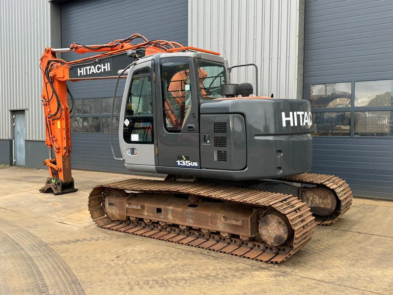Hitachi ZX135US - Bager gusjeničar: slika Hitachi ZX135US - Bager gusjeničar Hitachi ZX135US - Bager gusjeničar: slika Hitachi ZX135US - Bager gusjeničar