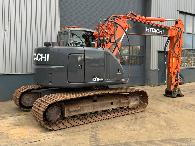 Hitachi ZX135US - Bager gusjeničar: slika Hitachi ZX135US - Bager gusjeničar Hitachi ZX135US - Bager gusjeničar: slika Hitachi ZX135US - Bager gusjeničar
