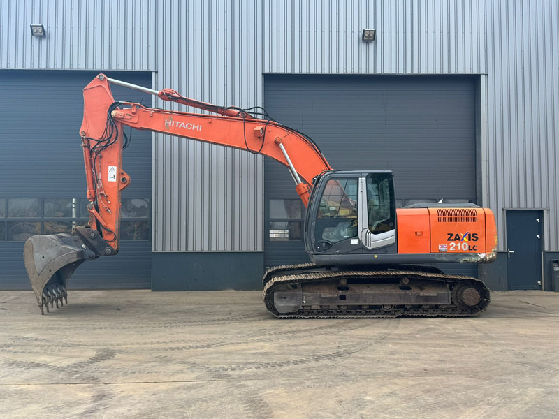 Hitachi ZX210LC-3 - Bager gusjeničar: slika Hitachi ZX210LC-3 - Bager gusjeničar Hitachi ZX210LC-3 - Bager gusjeničar: slika Hitachi ZX210LC-3 - Bager gusjeničar