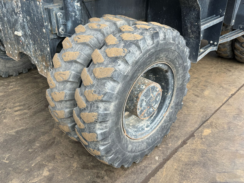 Bager na kotačima Komatsu PW180-11: slika Bager na kotačima Komatsu PW180-11