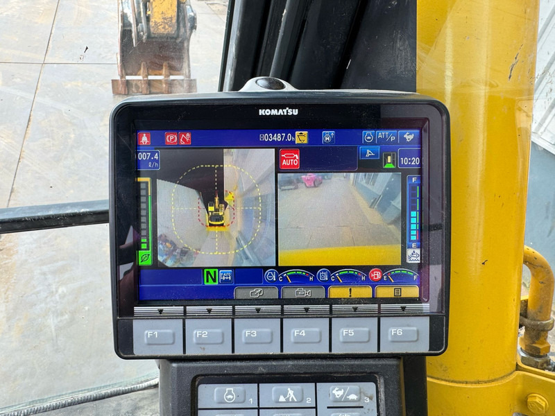 Bager na kotačima Komatsu PW180-11: slika Bager na kotačima Komatsu PW180-11