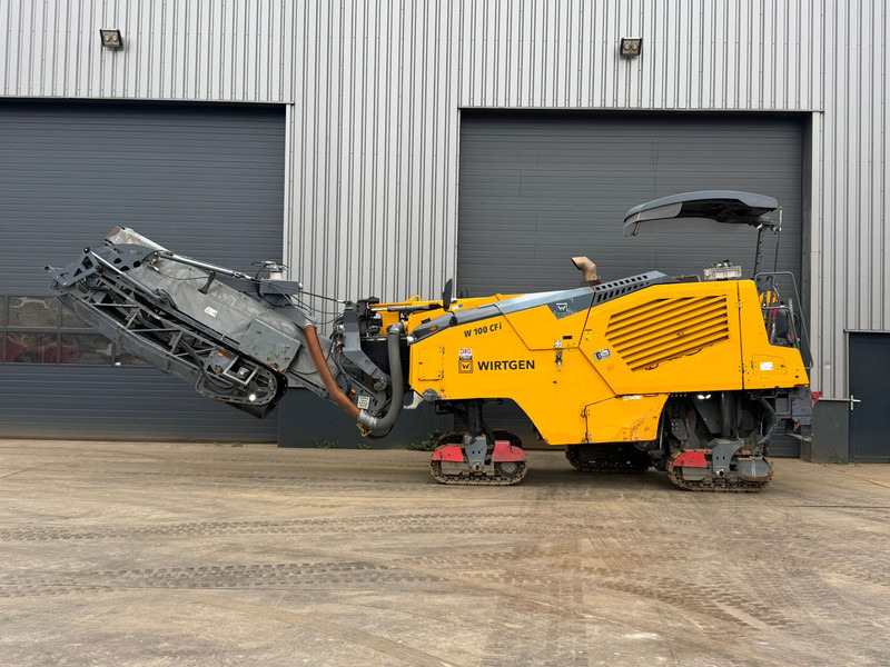 Wirtgen W100CFI - Stroj za asfaltiranje: slika Wirtgen W100CFI - Stroj za asfaltiranje Wirtgen W100CFI - Stroj za asfaltiranje: slika Wirtgen W100CFI - Stroj za asfaltiranje