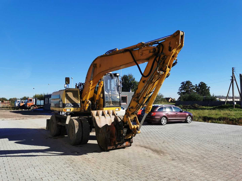Caterpillar M315 wheel excavator - Bager na kotačima: slika Caterpillar M315 wheel excavator - Bager na kotačima Caterpillar M315 wheel excavator - Bager na kotačima: slika Caterpillar M315 wheel excavator - Bager na kotačima