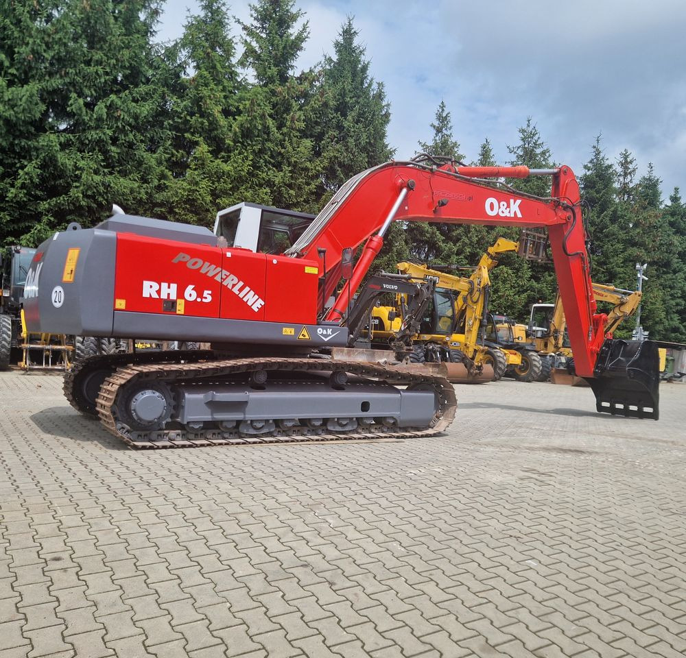 Koparka gąsienicowa O&K RH6,5 2003 Koparka gąsienicowa O&K - Bager gusjeničar: slika Koparka gąsienicowa O&K RH6,5 2003 Koparka gąsienicowa O&K - Bager gusjeničar Koparka gąsienicowa O&K RH6,5 2003 Koparka gąsienicowa O&K - Bager gusjeničar: slika Koparka gąsienicowa O&K RH6,5 2003 Koparka gąsienicowa O&K - Bager gusjeničar