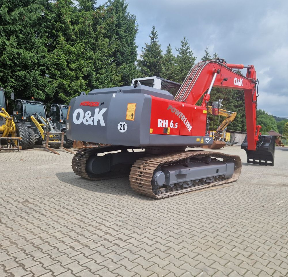 Koparka gąsienicowa O&K RH6,5 2003 Koparka gąsienicowa O&K - Bager gusjeničar: slika Koparka gąsienicowa O&K RH6,5 2003 Koparka gąsienicowa O&K - Bager gusjeničar Koparka gąsienicowa O&K RH6,5 2003 Koparka gąsienicowa O&K - Bager gusjeničar: slika Koparka gąsienicowa O&K RH6,5 2003 Koparka gąsienicowa O&K - Bager gusjeničar