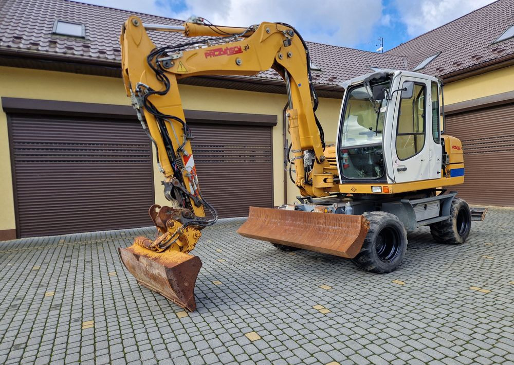 Koparka kołowa Liebherr A311 2008 Liebherr - Bager na kotačima: slika Koparka kołowa Liebherr A311 2008 Liebherr - Bager na kotačima Koparka kołowa Liebherr A311 2008 Liebherr - Bager na kotačima: slika Koparka kołowa Liebherr A311 2008 Liebherr - Bager na kotačima