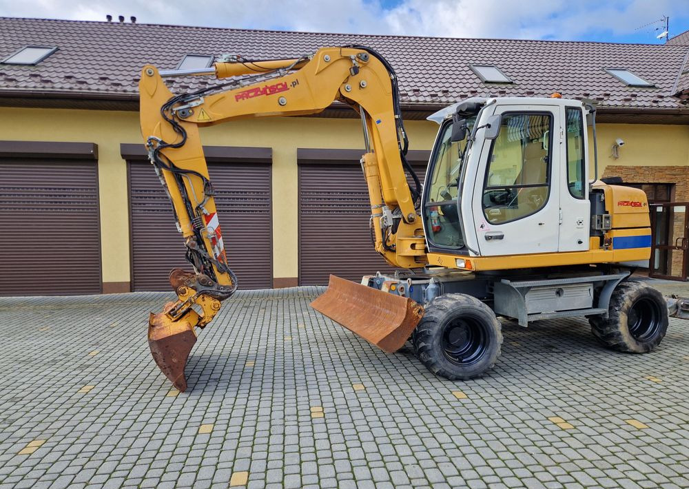 Koparka kołowa Liebherr A311 2008 Liebherr - Bager na kotačima: slika Koparka kołowa Liebherr A311 2008 Liebherr - Bager na kotačima Koparka kołowa Liebherr A311 2008 Liebherr - Bager na kotačima: slika Koparka kołowa Liebherr A311 2008 Liebherr - Bager na kotačima