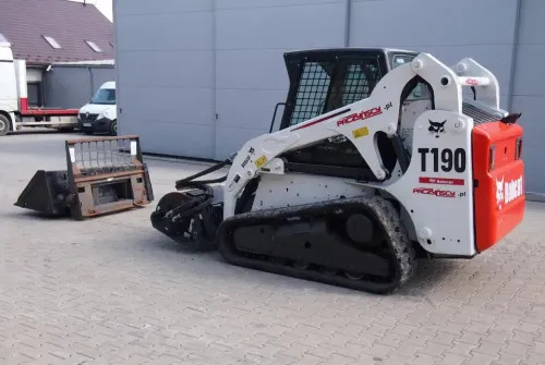 Kompaktni utovarivač gusjeničar Miniładowarka Bobcat T190 2012: slika Kompaktni utovarivač gusjeničar Miniładowarka Bobcat T190 2012 Kompaktni utovarivač gusjeničar Miniładowarka Bobcat T190 2012: slika Kompaktni utovarivač gusjeničar Miniładowarka Bobcat T190 2012