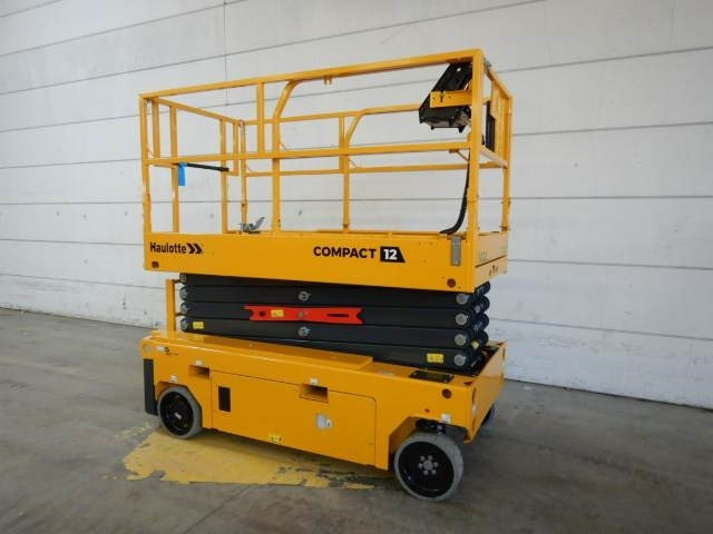 Haulotte Compact 12 AE - Škarasta podizna platforma: slika Haulotte Compact 12 AE - Škarasta podizna platforma Haulotte Compact 12 AE - Škarasta podizna platforma: slika Haulotte Compact 12 AE - Škarasta podizna platforma