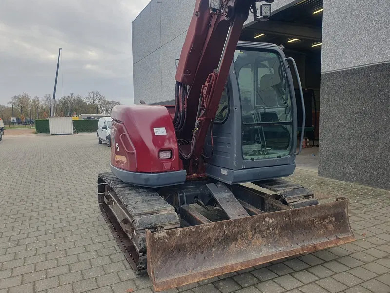 New Holland Kobelco E70 - 8 TON - Mini bager: slika New Holland Kobelco E70 - 8 TON - Mini bager New Holland Kobelco E70 - 8 TON - Mini bager: slika New Holland Kobelco E70 - 8 TON - Mini bager
