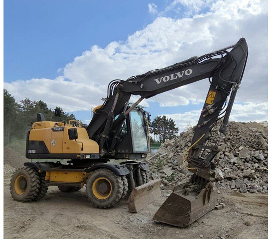 Volvo EW 140D (17t) - Bager na kotačima: slika Volvo EW 140D (17t) - Bager na kotačima Volvo EW 140D (17t) - Bager na kotačima: slika Volvo EW 140D (17t) - Bager na kotačima