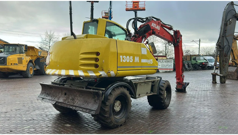 Atlas 1305 - Bager na kotačima: slika Atlas 1305 - Bager na kotačima Atlas 1305 - Bager na kotačima: slika Atlas 1305 - Bager na kotačima