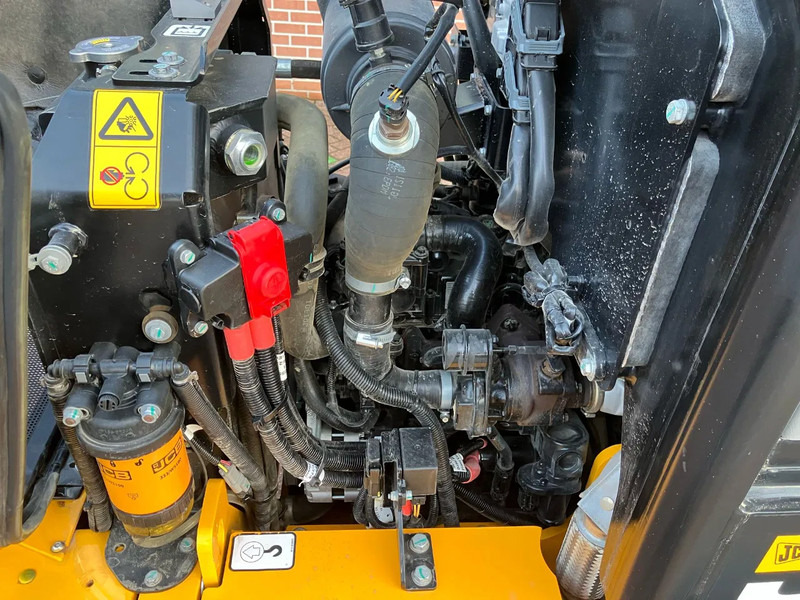 JCB 403 PLUS - Kompaktni utovarivač gusjeničar: slika JCB 403 PLUS - Kompaktni utovarivač gusjeničar JCB 403 PLUS - Kompaktni utovarivač gusjeničar: slika JCB 403 PLUS - Kompaktni utovarivač gusjeničar