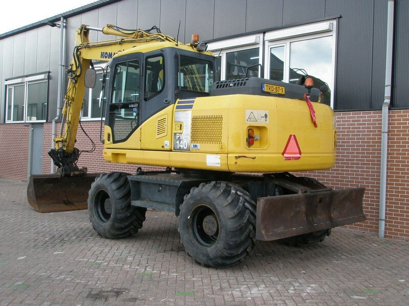 Komatsu PW140-7 - Bager na kotačima: slika Komatsu PW140-7 - Bager na kotačima Komatsu PW140-7 - Bager na kotačima: slika Komatsu PW140-7 - Bager na kotačima
