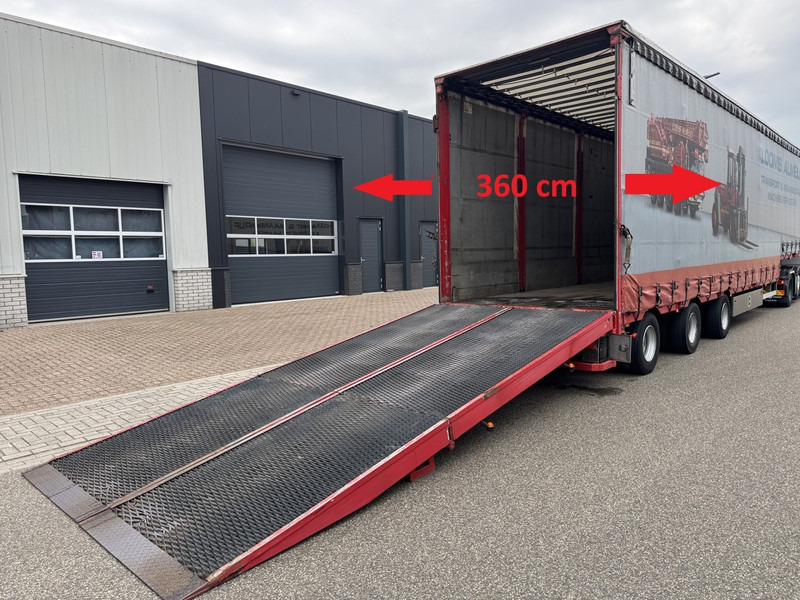 Jumbo Semi-lowloader, expandable and increaseable, Ramps 510 cm - Poluprikolica s niskim utovarivačem: slika Jumbo Semi-lowloader, expandable and increaseable, Ramps 510 cm - Poluprikolica s niskim utovarivačem Jumbo Semi-lowloader, expandable and increaseable, Ramps 510 cm - Poluprikolica s niskim utovarivačem: slika Jumbo Semi-lowloader, expandable and increaseable, Ramps 510 cm - Poluprikolica s niskim utovarivačem