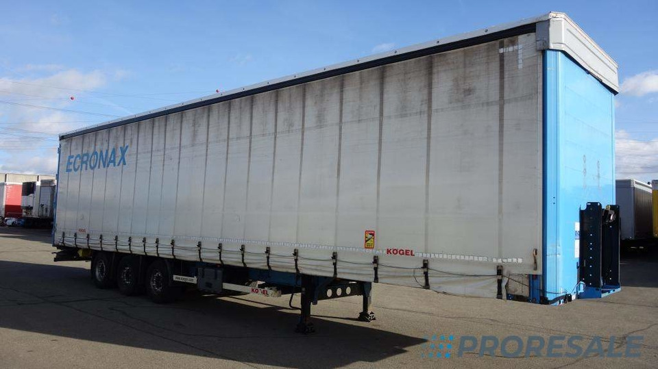 KÖGEL SN 24 MEGA - bočnicový - Poluprikolica s ceradom: slika KÖGEL SN 24 MEGA - bočnicový - Poluprikolica s ceradom KÖGEL SN 24 MEGA - bočnicový - Poluprikolica s ceradom: slika KÖGEL SN 24 MEGA - bočnicový - Poluprikolica s ceradom