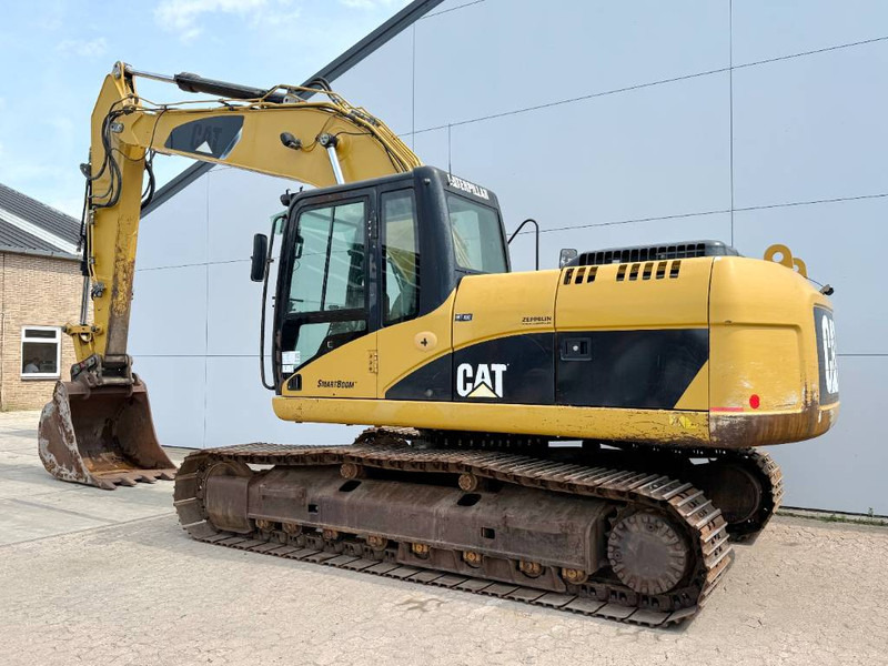 Cat 323DL - German Machine / Quick Coupler - Bager gusjeničar: slika Cat 323DL - German Machine / Quick Coupler - Bager gusjeničar Cat 323DL - German Machine / Quick Coupler - Bager gusjeničar: slika Cat 323DL - German Machine / Quick Coupler - Bager gusjeničar