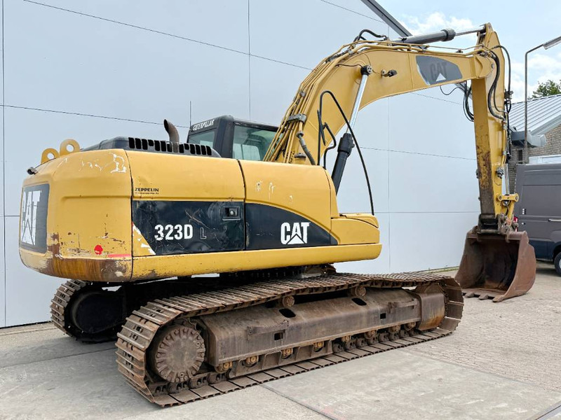 Cat 323DL - German Machine / Quick Coupler - Bager gusjeničar: slika Cat 323DL - German Machine / Quick Coupler - Bager gusjeničar Cat 323DL - German Machine / Quick Coupler - Bager gusjeničar: slika Cat 323DL - German Machine / Quick Coupler - Bager gusjeničar