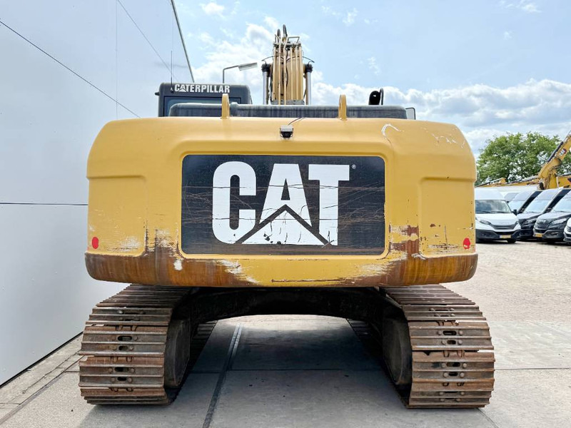 Cat 323DL - German Machine / Quick Coupler - Bager gusjeničar: slika Cat 323DL - German Machine / Quick Coupler - Bager gusjeničar Cat 323DL - German Machine / Quick Coupler - Bager gusjeničar: slika Cat 323DL - German Machine / Quick Coupler - Bager gusjeničar