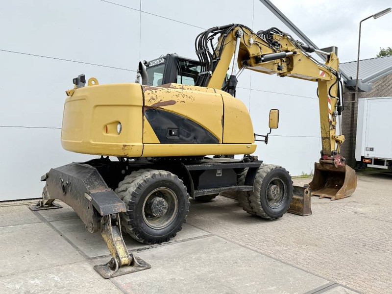 Cat M313D - Triple Boom / Quick Coupler / Camera - Bager na kotačima: slika Cat M313D - Triple Boom / Quick Coupler / Camera - Bager na kotačima Cat M313D - Triple Boom / Quick Coupler / Camera - Bager na kotačima: slika Cat M313D - Triple Boom / Quick Coupler / Camera - Bager na kotačima