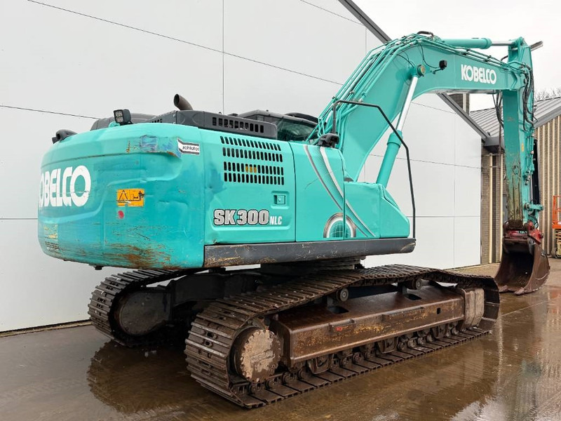 Kobelco SK300NLC-10 - Hammer Lines / Quick Coupler - Bager gusjeničar: slika Kobelco SK300NLC-10 - Hammer Lines / Quick Coupler - Bager gusjeničar Kobelco SK300NLC-10 - Hammer Lines / Quick Coupler - Bager gusjeničar: slika Kobelco SK300NLC-10 - Hammer Lines / Quick Coupler - Bager gusjeničar