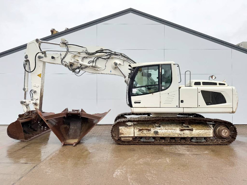 Liebherr R906LC Litronic - 2 Buckets / Quick Coupler - Bager gusjeničar: slika Liebherr R906LC Litronic - 2 Buckets / Quick Coupler - Bager gusjeničar Liebherr R906LC Litronic - 2 Buckets / Quick Coupler - Bager gusjeničar: slika Liebherr R906LC Litronic - 2 Buckets / Quick Coupler - Bager gusjeničar