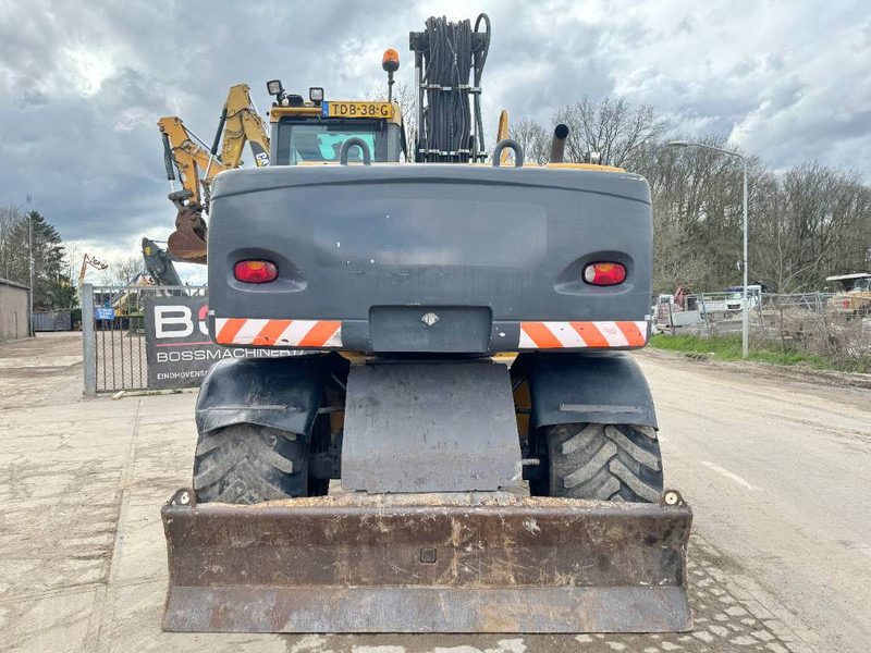 Volvo EW140C - DUTCH MACHINE - Bager na kotačima: slika Volvo EW140C - DUTCH MACHINE - Bager na kotačima Volvo EW140C - DUTCH MACHINE - Bager na kotačima: slika Volvo EW140C - DUTCH MACHINE - Bager na kotačima