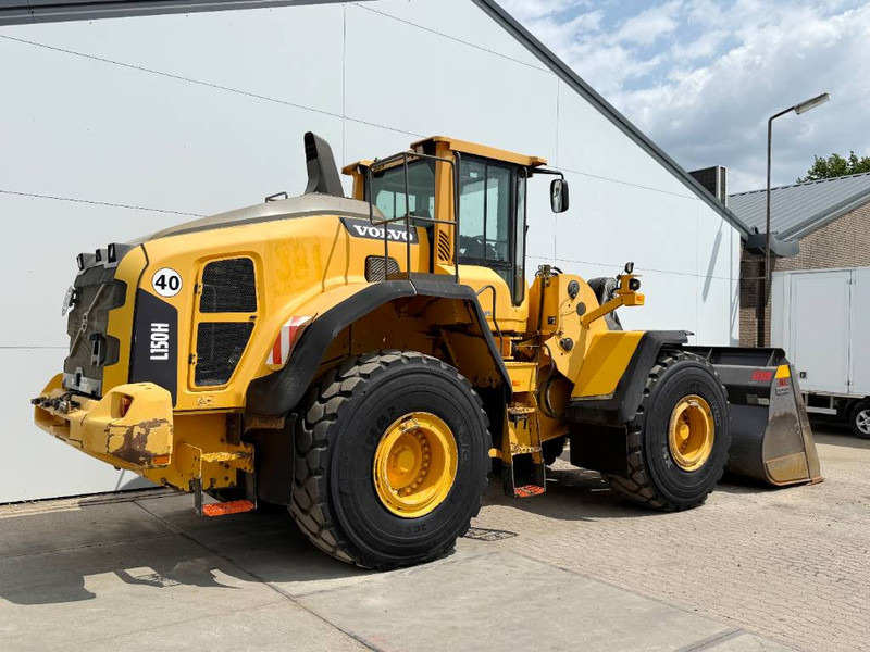 Volvo L150H - German Machine / 3rd Function - Utovarivač na kotačima: slika Volvo L150H - German Machine / 3rd Function - Utovarivač na kotačima Volvo L150H - German Machine / 3rd Function - Utovarivač na kotačima: slika Volvo L150H - German Machine / 3rd Function - Utovarivač na kotačima