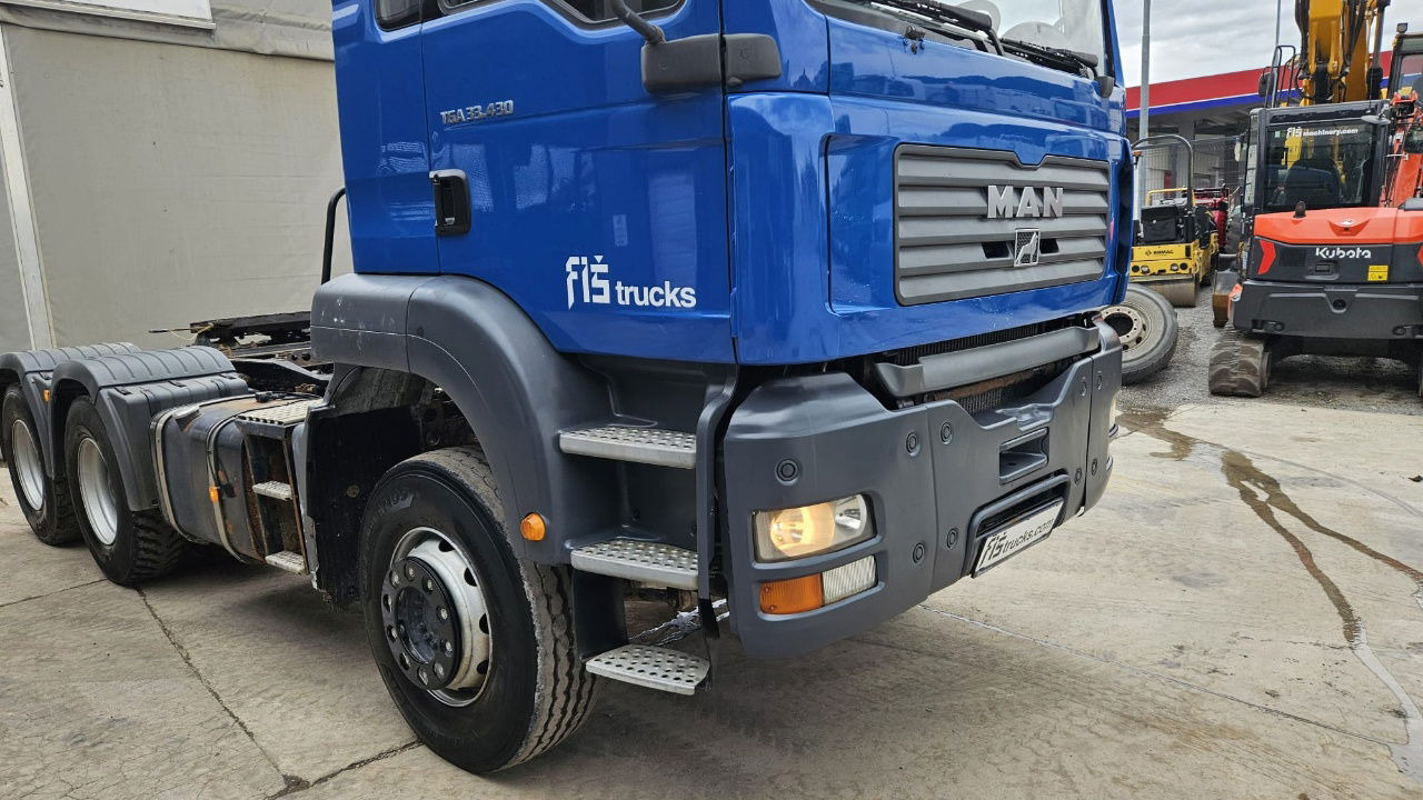 MAN TGA 33.430 6x4 tractor unit - tipper hydraulics - Tegljač: slika MAN TGA 33.430 6x4 tractor unit - tipper hydraulics - Tegljač MAN TGA 33.430 6x4 tractor unit - tipper hydraulics - Tegljač: slika MAN TGA 33.430 6x4 tractor unit - tipper hydraulics - Tegljač