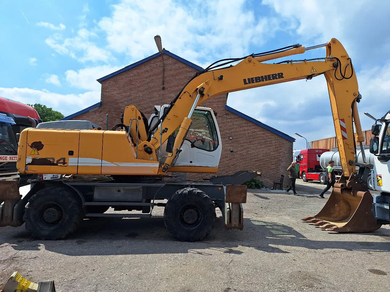 Liebherr A904C - Bager na kotačima: slika Liebherr A904C - Bager na kotačima Liebherr A904C - Bager na kotačima: slika Liebherr A904C - Bager na kotačima